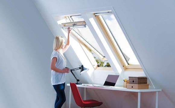 Keylite pine roof windows being opened